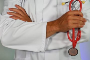 Close up of Doctor carrying a Stethoscope