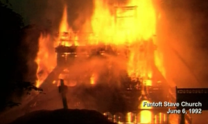 screenshot from news footage of a church on fire from an arson attack