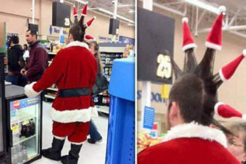 punk with a mohawk dressed as santa with small santa hats on his mohawk spikes