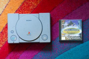 playstation 1 next to a copy of Tony hawks pro Skater 1 for the Playstation 1